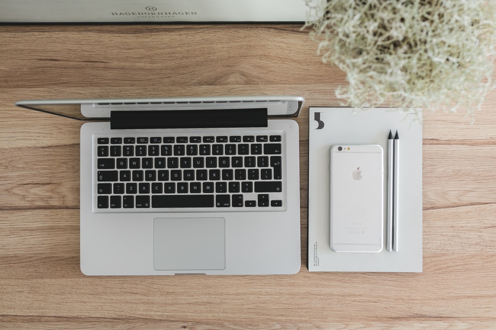 kaboompics.com_Top view of Apple Macbook and iPhone 6 Plus on the desk.jpg